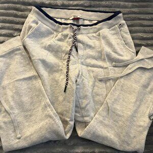 Tommy Hilfiger, sweatpants with lace up ties on the bottom, size M; light gray